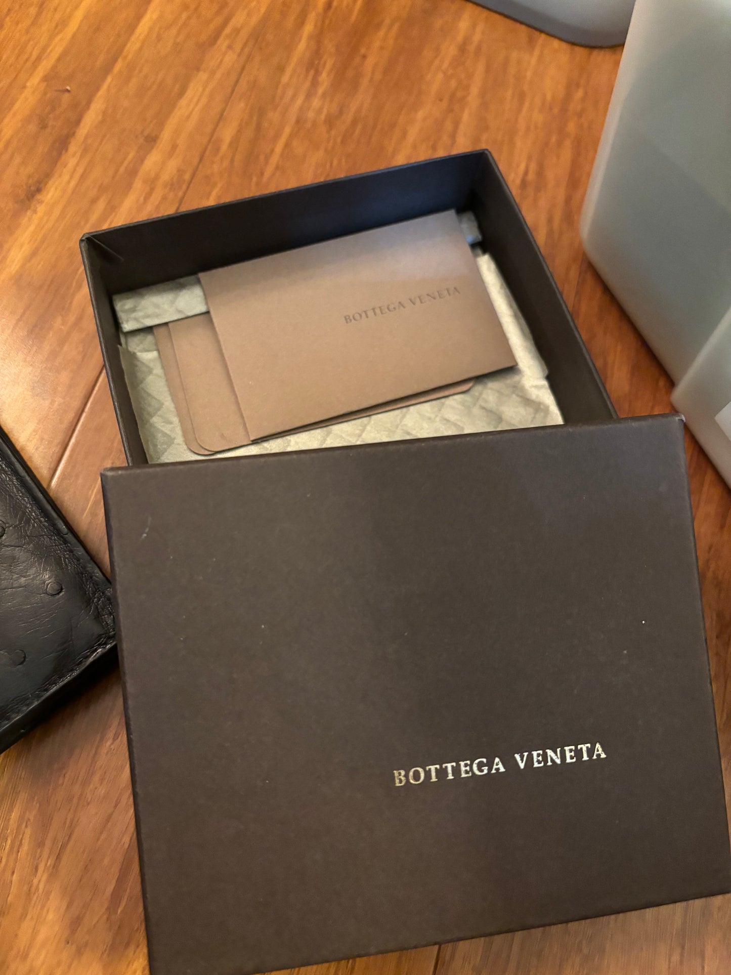 Mens Bottega Ostrich Leather Bi-fold wallet in Black