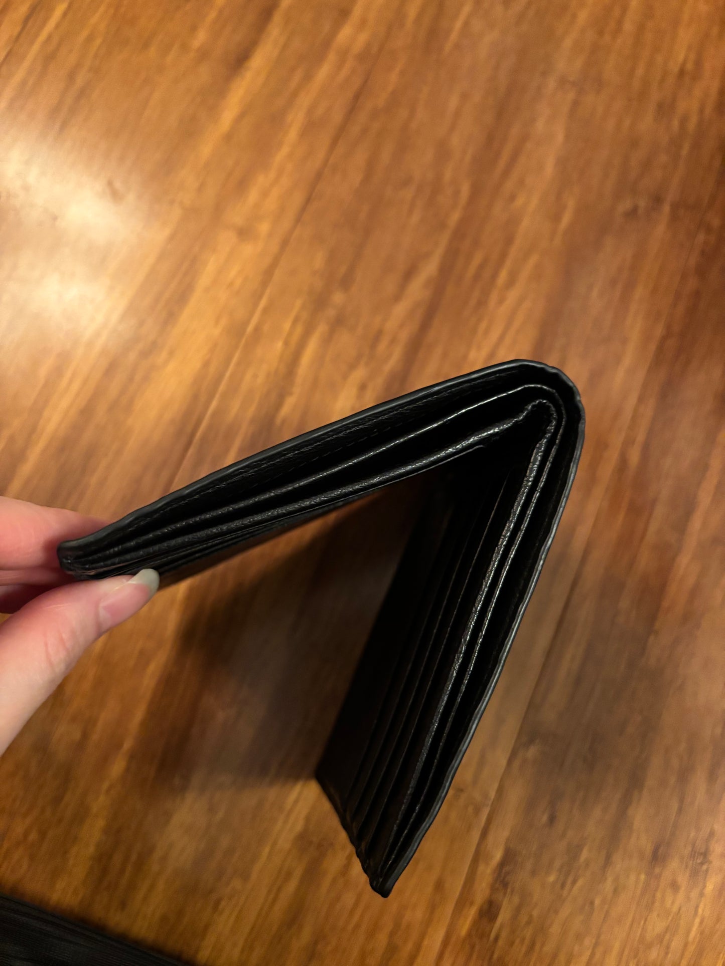 Mens Bottega Ostrich Leather Bi-fold wallet in Black