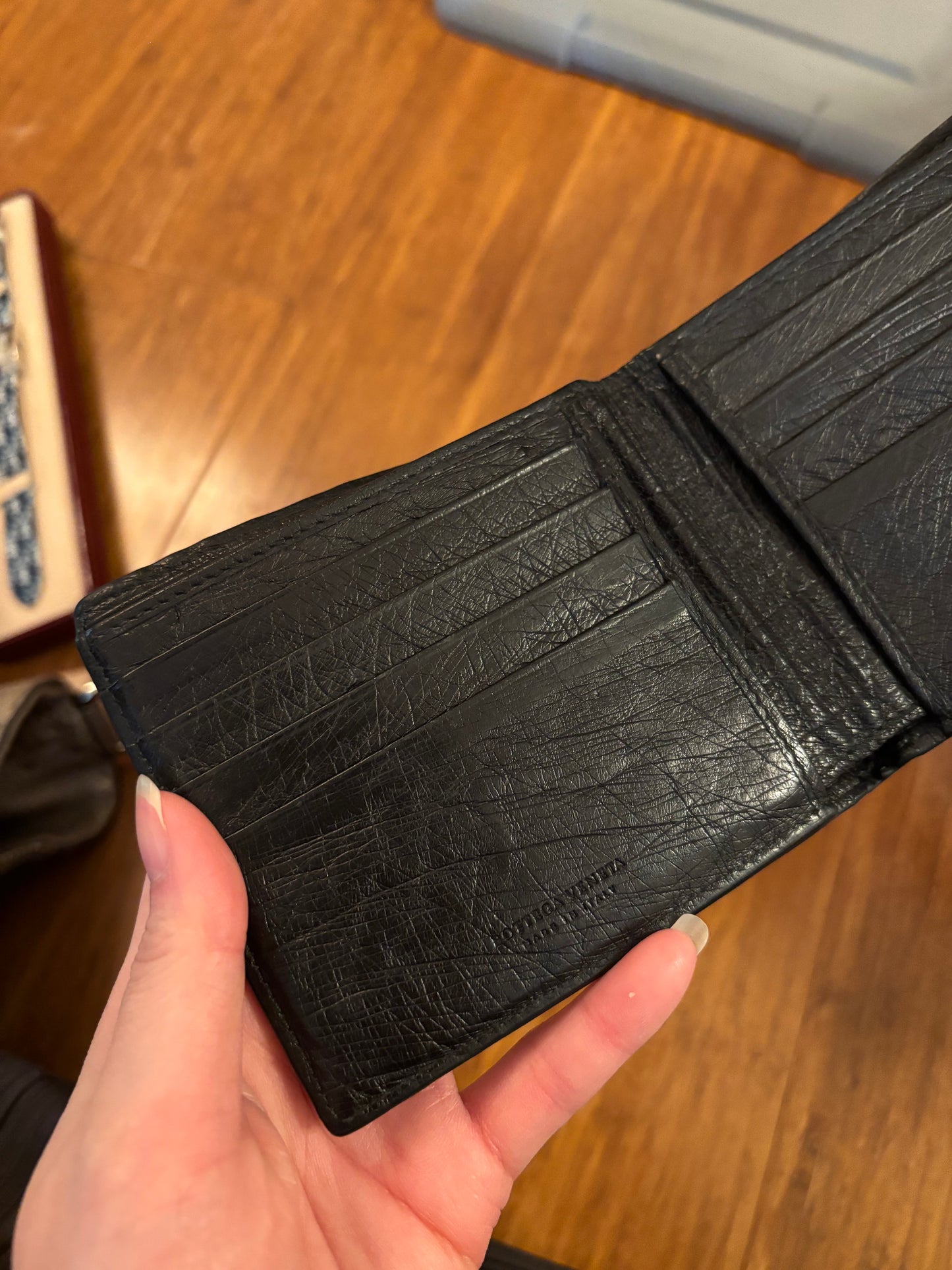 Mens Bottega Ostrich Leather Bi-fold wallet in Black