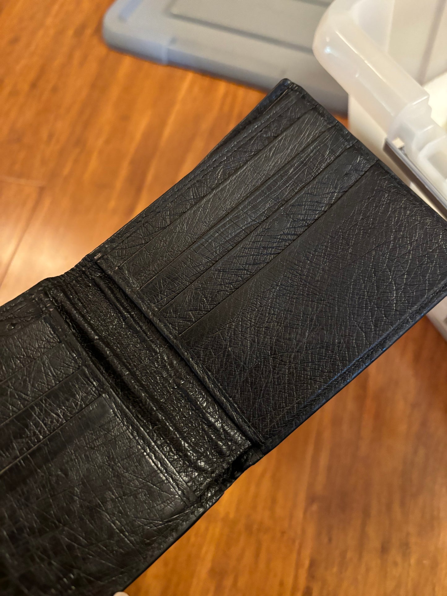 Mens Bottega Ostrich Leather Bi-fold wallet in Black